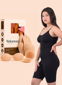 The four kit pieces beside a model wearing the black bodysuit