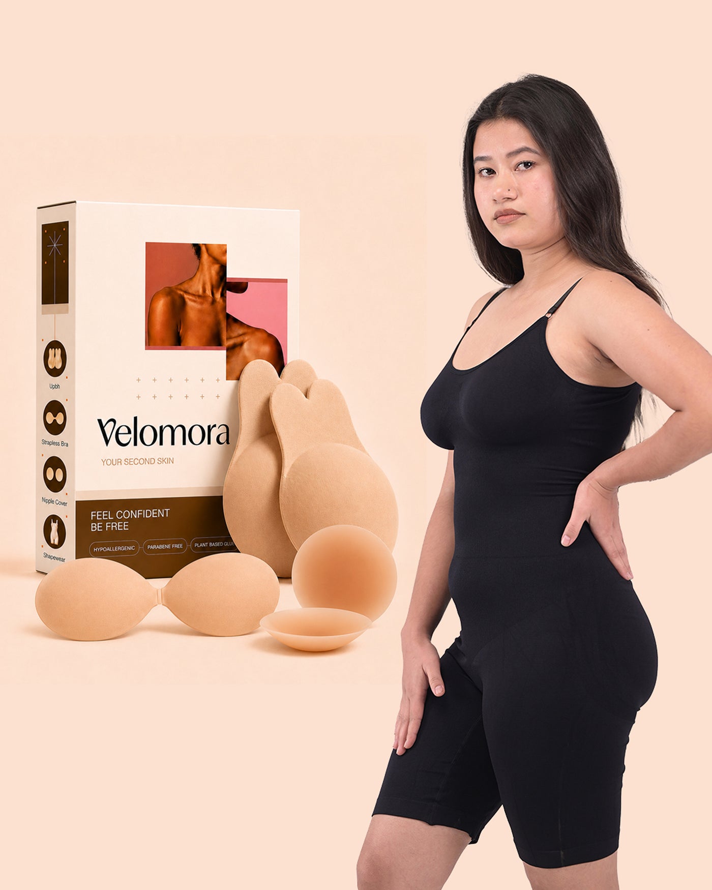 The four kit pieces beside a model wearing the black bodysuit