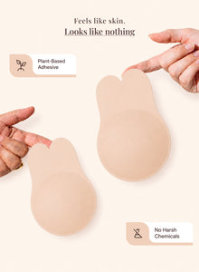 Fingers pressing the plant-based adhesive lift, marked no harsh chemicals
