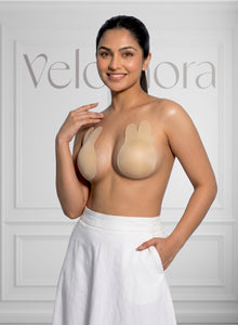Model wearing the rabbit-ear lift tape, side view