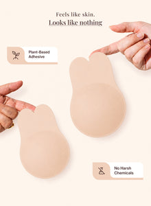 Fingers pressing the plant-based adhesive lift, marked no harsh chemicals