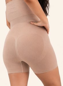 Close-up from behind showing the seamless leg of the bodysuit
