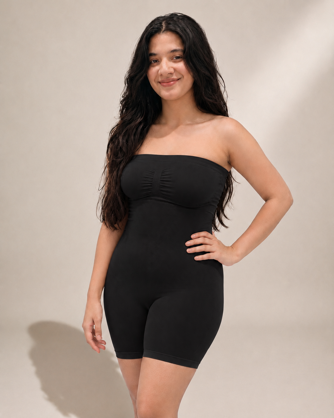 Model wearing the black bodysuit strapless