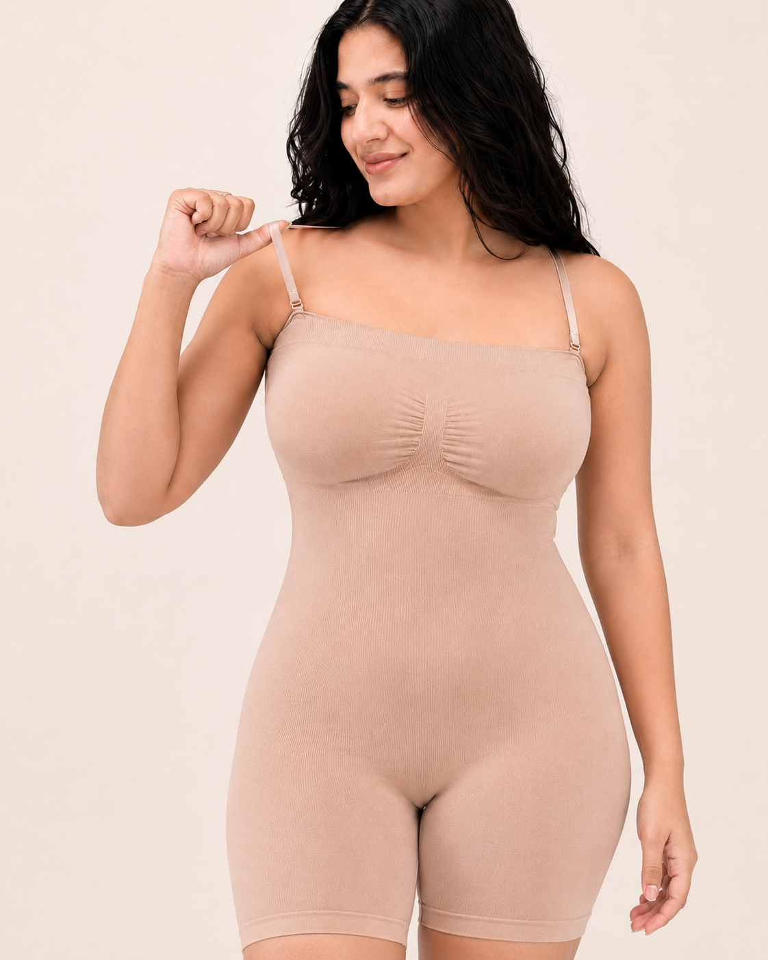 Model wearing the beige bodysuit strapless